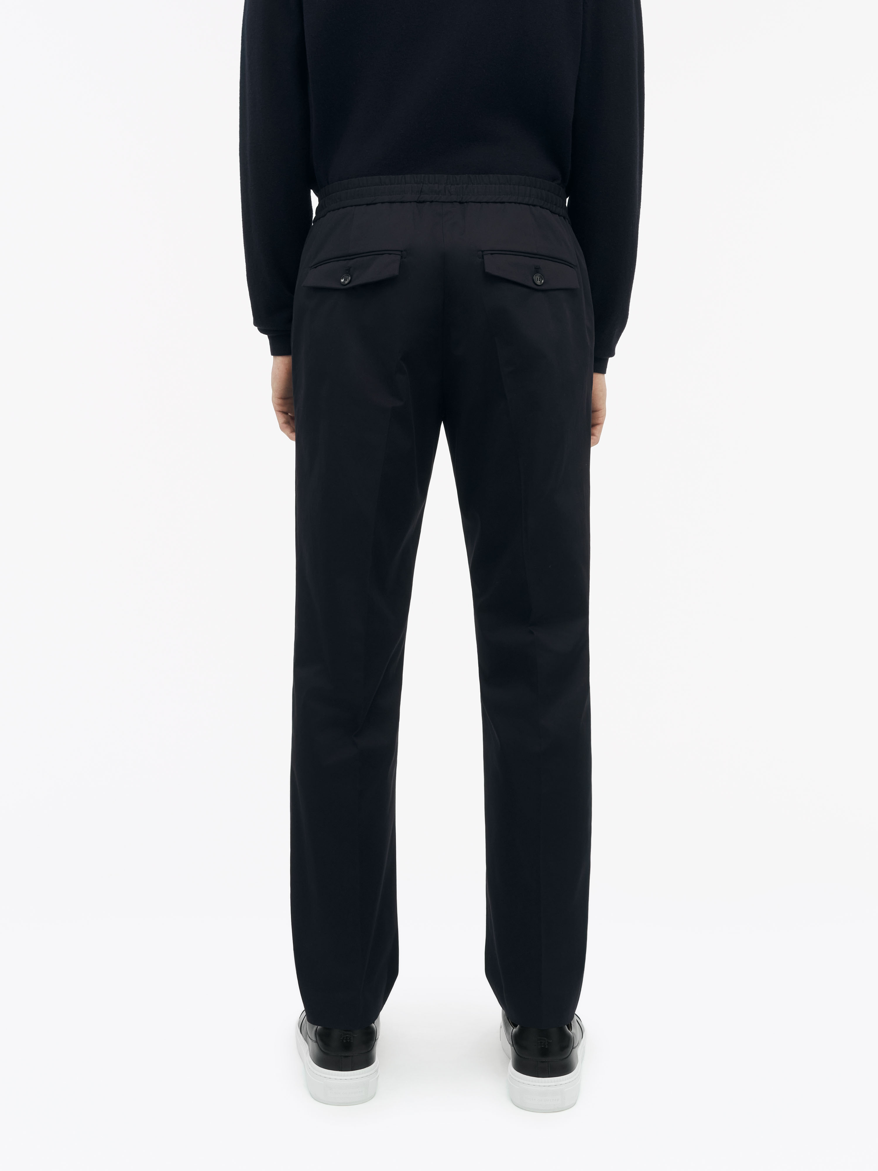 Man in black chinos